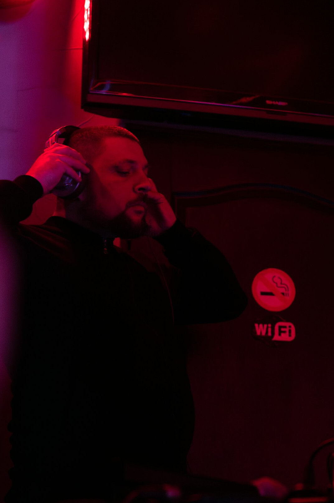 Person recording a voiceover in a sound booth