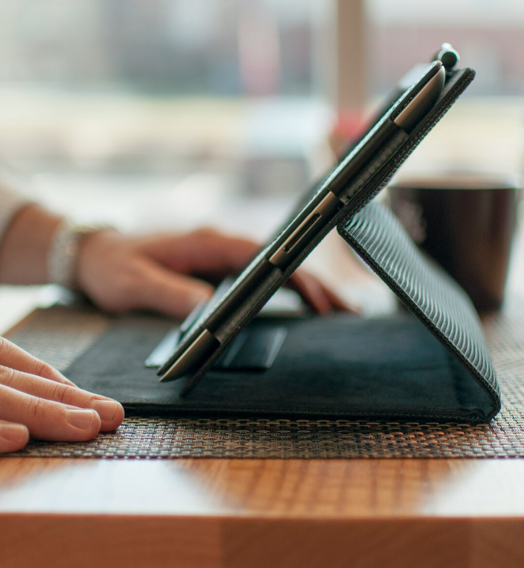 person reading blog on tablet